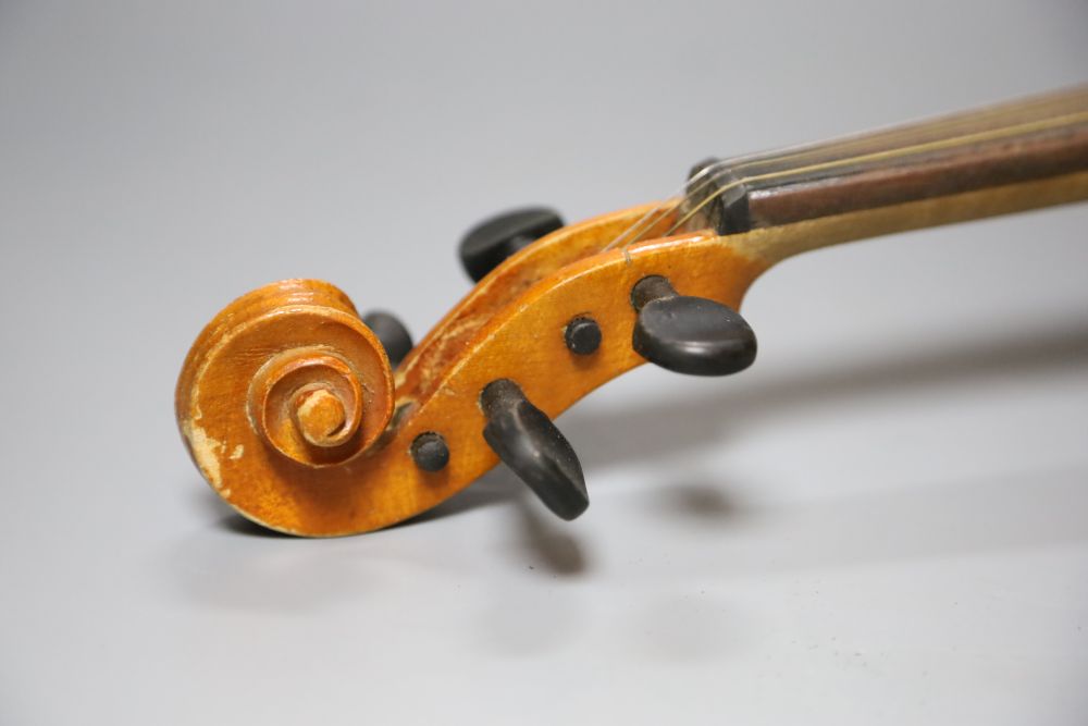 An early 20th century Czechoslovakian 3/4 size violin, bears fake Stradivarius label, cased